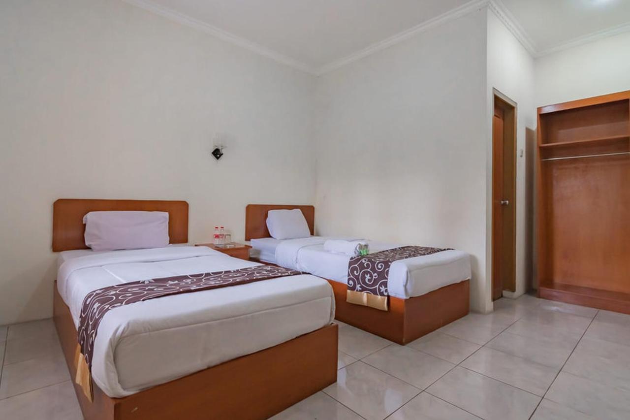 Hotel Puspa Sari Redpartner تْشياتِر المظهر الخارجي الصورة